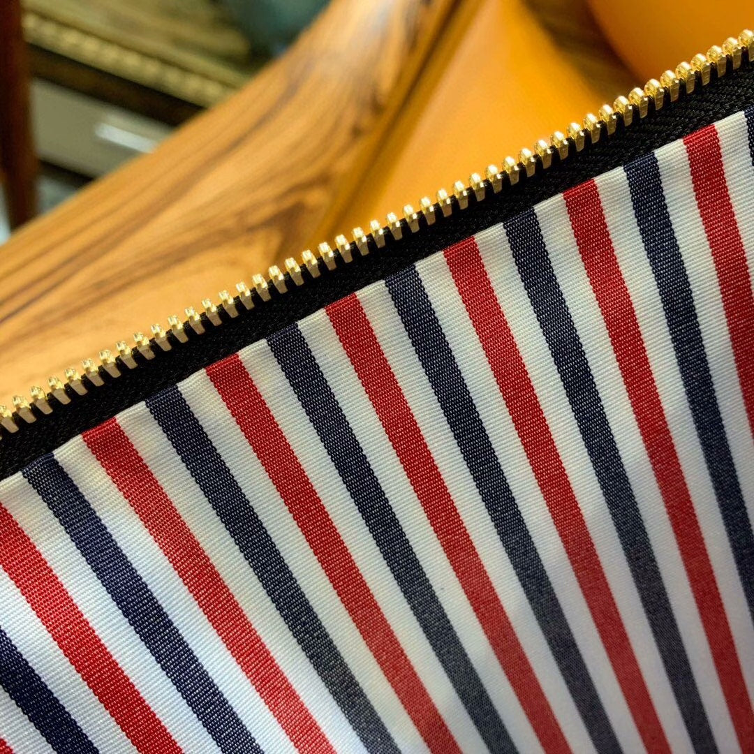 Three-color woven clutch bag THOM TREND