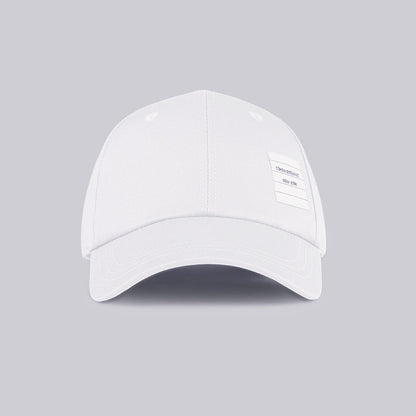 Solid color cap THOM TREND